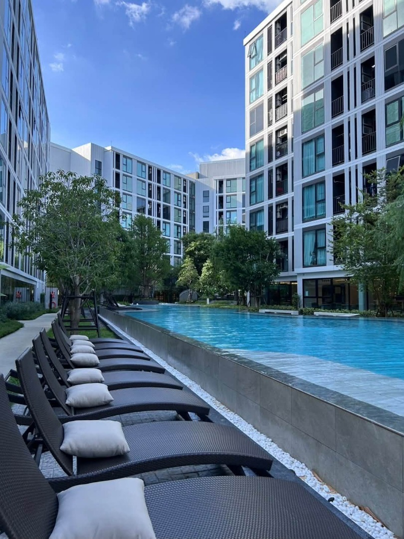 Atmoz Oasis Onnut 26sqm. ห้องแบบครัวติดระเบียง ปิดกระจกแยกห้อง